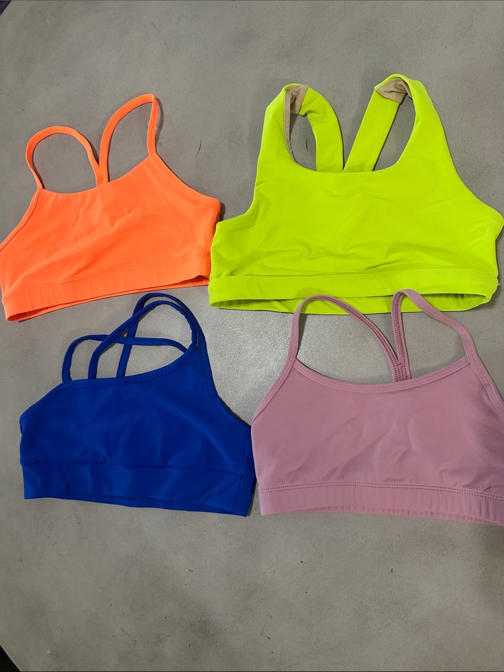 Set of Four Neon & Pastel Sports Bras - Orange, Neon Yellow, Blue, Pink